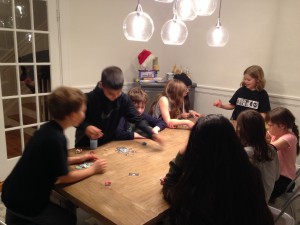 Hannah and Jonah have some friends over for a massive game of dreidel and a Chanukah party. Killing time waiting for Kristens' amazing home-made egg-free Latkes.