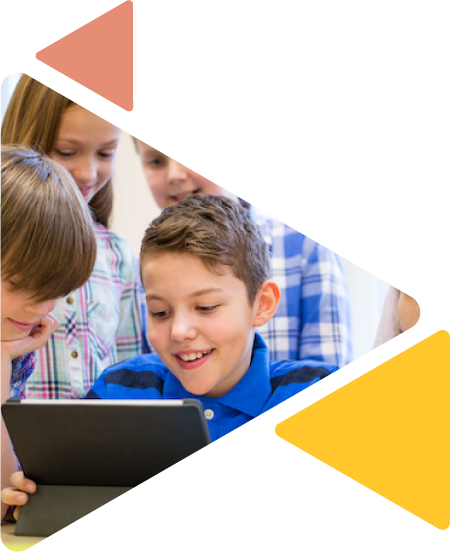 group of students smiling around a tablet